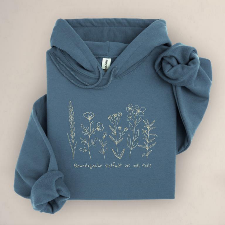 Gemütlicher Unisex aus Baumwolle Hoodie mit floraler Illustration und dem Schriftzug „Neurologische Vielfalt ist voll toll!“ – Statement für neurodivergente Sichtbarkeit.
