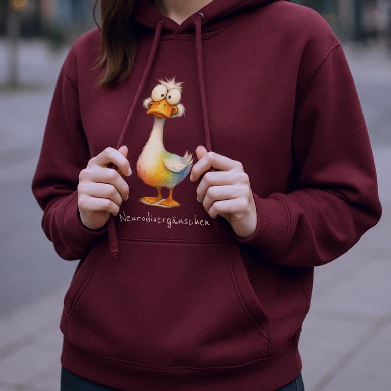Hoodie mit Gänsemotiv und Aufdruck „Neurodivergänschen“ – humorvolles Statement für Autist:innen, ADHS und neurodivergente Identität.