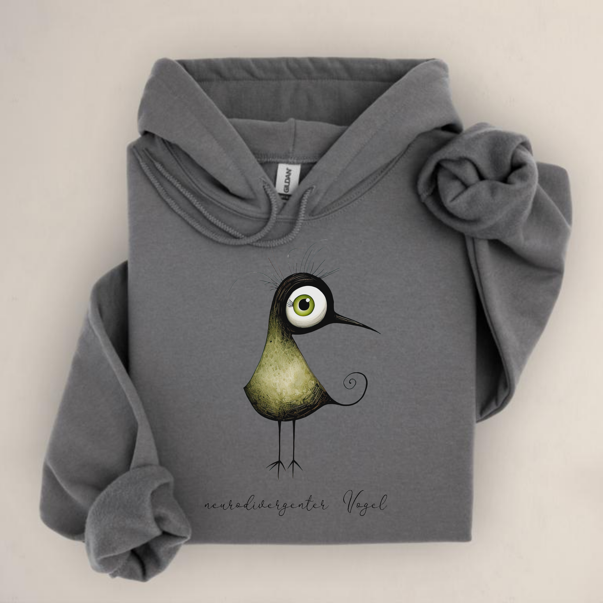 Hoodie mit schrägem Vogelmotiv und Schriftzug „neurodivergenter Vogel“ – ideal für ADHS, Autismus oder neuroaffirmative Mode.